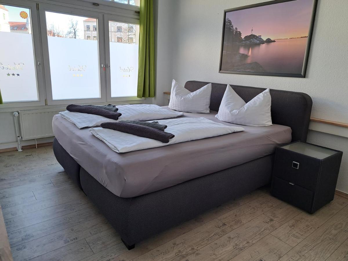 Apartment-Hotel Schillerplatz Wittenberge Bagian luar foto